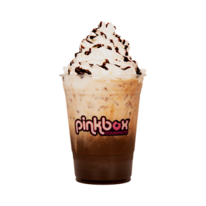 Pinkbox Doughnuts iced coffee topped with whipped cream and chocolate drizzle